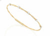 Yellow Gold Diamond Twisting Bangle Bracelet.