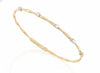 Yellow Gold Diamond Twisting Bangle Bracelet.