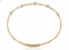 Yellow Gold Diamond Twisting Bangle Bracelet.