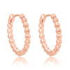 Rose Gold Beaded Huggie Earrings.