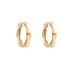 Yellow Gold Textured Huggie Earrings.