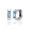 Sterling Silver Lab Created Blue Topaz Huggie Earrings.